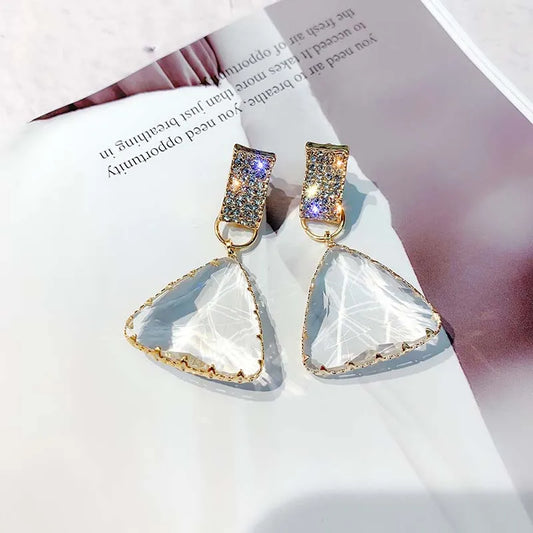 Stunning triangular crystal earrings with rhinestone studded top.  Highest quality of 925 sterling silver.